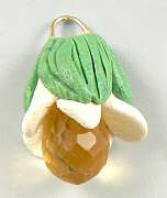 Clay flower with glass bead center
